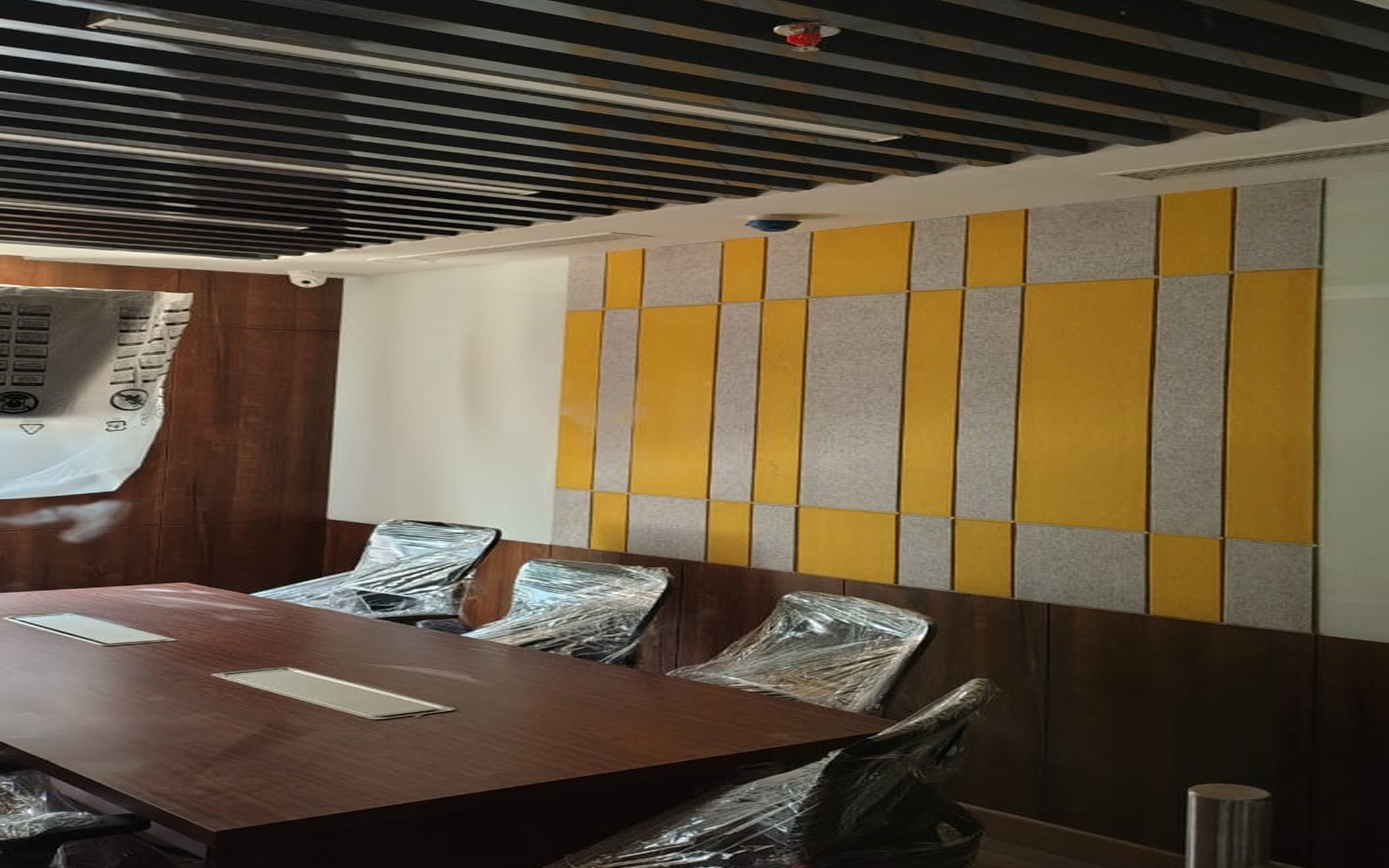 Modern interior with refined ceiling and wall finishes